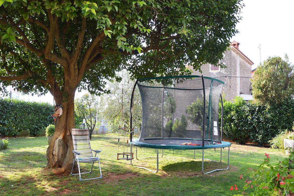 Giardino Apartment Umag Bagian luar foto